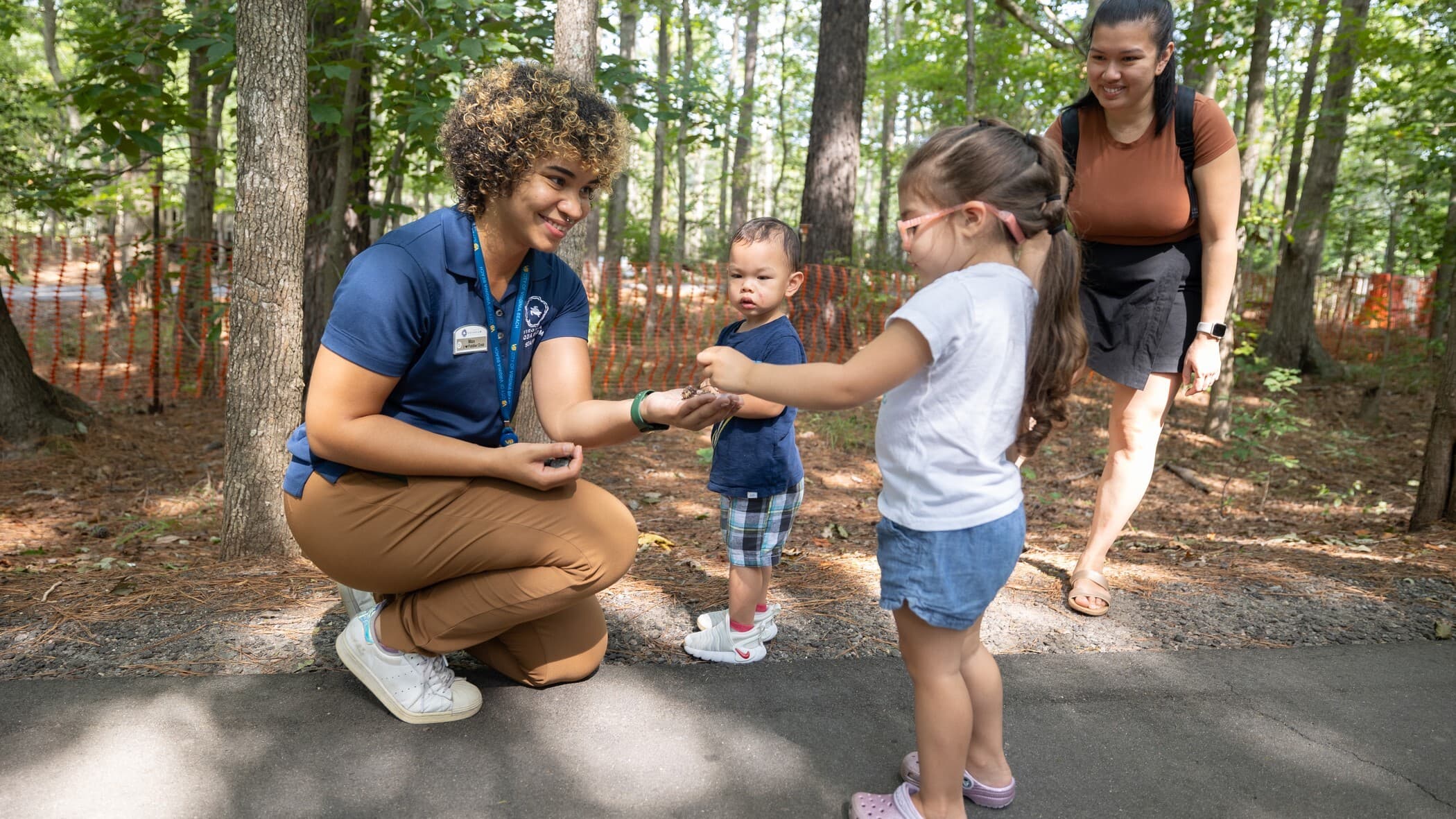 Aquarium Educator with Toddlers on Nature Trail